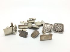 Five pairs of silver cufflinks