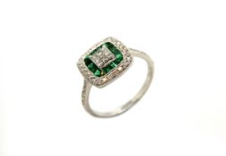 Emerald and diamond cluster ring