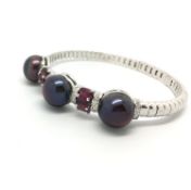 Black Tahitian pearl, pink tourmaline 18ct bangle