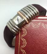 Ladies' Cartier Bangle watch + papers