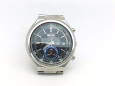 Vintage Seiko chronograph automatic, black dial with daydate aperture, subsidiary seconds dial,