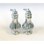 A pair of Indian Silver Pepperettes, Hallmarked 1860 by Charles Nephew & Co Calcutta Height 13cm