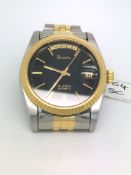 Gentleman's Bulova steel and gold plated wrist watch, circular black dial with baton hour markers,