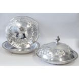 A pair of early nineteenth century Irish silver entree dishes, each of circular form with oblique