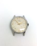 Vintage Omega wristwatch, circular dial with gilt hands and hour markers, chromium case, inner