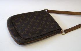 A Louis Vuitton 'Musette' monogram shoulder bag, with large flap, alcantara interior with inside