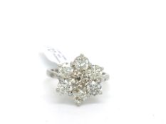 Diamond cluster ring, seven round brilliant cut diamonds weighing an estimated 2.46cts in total,