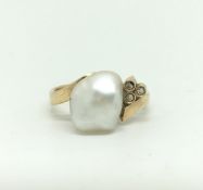 Pearl and Diamond Ring. Band stamped 585