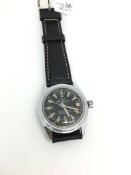 Vintage Tara self-winding wrist watch, black dial with lumina hour markers, date aperture, centre