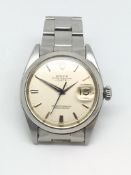 Rolex Gents Oyster Perpetual Date Ref 1500. Dagger hands and fully signed throughout in a