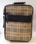 Burberry Travel suitcase, leather Burberry pattern case with canvas interior, wheels and