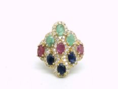 Sapphire, Ruby, Emerald and Diamond Dress Ring in yellow metal stamped 9ct. Size N, 6.5 grams