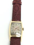 Vintage Waltham wrist watch, rectangular cushion dial with gilt Arabic numerals, red centre