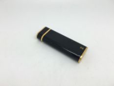 Cartier lighter, black enamel with gilt edges, gold plated