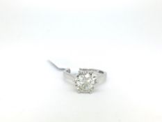 Single stone diamond ring, round brilliant cut diamond in an illusion six claw setting, in white