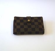 A Louis Vuitton damier ebene wallet with coin purse, credit card slots and note compartment, code