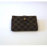 A Louis Vuitton damier ebene wallet with coin purse, credit card slots and note compartment, code