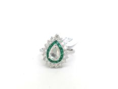 Art Deco style emerald and diamond ring, central pear rose cut diamond weighing an estimated 0.