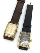 Two art deco watches including a black dial Bulova, rectangular cushion shaped dial with gilt