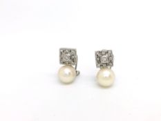 Pearl and Diamond White Gold Earrings. Stamped 9k on posts