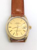 Gentlemen's Rolex Oyster Perpetual Date, gilt dial with baton hour markers and date aperture, gold