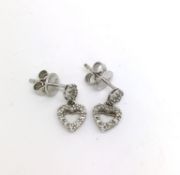 Diamond Heart stud earrings. Stamped 375 9ct