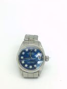 Ladies' Rolex Oyster Perpetual DateJust, blue diamond dot dial, stainless steel case and bracelet