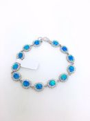 Synthetic opal and cubic zirconia bracelet, set in white metal stamped silver