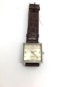 Early Accurst automatic, square dial with abstract hour markers, date aperture to 4/5 o'clock