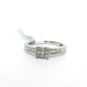 Diamond cluster ring, central nine princess cut diamonds set in a square, with baguette cut