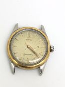 Vintage Omega Seamaster, circular dial with gold baton hour markers, gold bezel, stainless steel