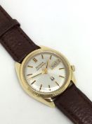 Gentleman's Vintage 14k Bulova Accutron, silvered dial with baton hour markers, day date aperture,