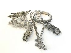 A large quantity of mostly silver marcasite set Jewellery, including bangle, brooches and double