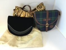 A tartan shoulder bag with brown leather trim, a black velvet clutch bag with diamante details and a