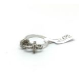 Diamond set bow design ring, claw set diamonds, in white metal stamped and tested as 18ct, ring size