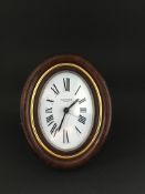 Cartier bedside table clock. Manual wind with alarm. The clock is in full working order and glided