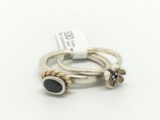Pandora, two silver pandora stacking rings, one set with a black stone, no60, the other with