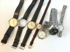 A mixed bag of watches, including a Bi- colour Longines Conquest and Bulova watch, gross weight