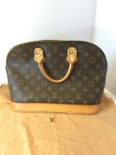 A Louis Vuitton monogram canvas â€œAlmaâ€ bag, date code BA1001, with original dust bag and