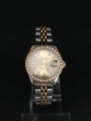 Rolex Ladies Datejust Steel and Gold. The bezel and dial are diamond set. The case and bracelet is