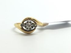 Diamond three stone cross over ring, old cut diamond with two rose cuts, set within a cross over