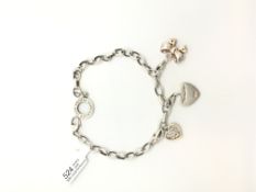 Thomas Sabo silver charm bracelet with three charms including stone set bow and heart charms, 20cm