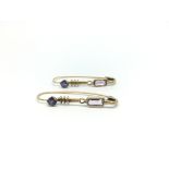 Amethyst earrings, french wire and clip fittings, in yellow metal stamped and tested as 9ct