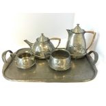 Five piece Tudoric pewter tea service, retailed by Liberty & Co, each piece numbered and marked â€˜