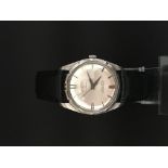 Vintage Waltham automatic, silvered circular dial with Arabic numerals, dagger hour markers and