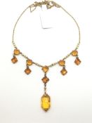 Vintage orange paste and pearl fringe necklace, orange paste stones claw set with centre lozenge cut