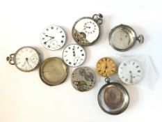 A selection of pocket watch part and cases, including silver cases and a movement with ornate gilt