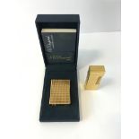 Dupont lighter boxed with paperwork together with a dunhill lighter