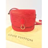 A Louis Vuitton red epi leather â€œSt Cloudâ€ handbag with gilt hardware, date code TH0945, with