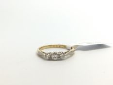 Diamond three stone ring, three transitional cut diamonds claw set, estimated total diamond weight